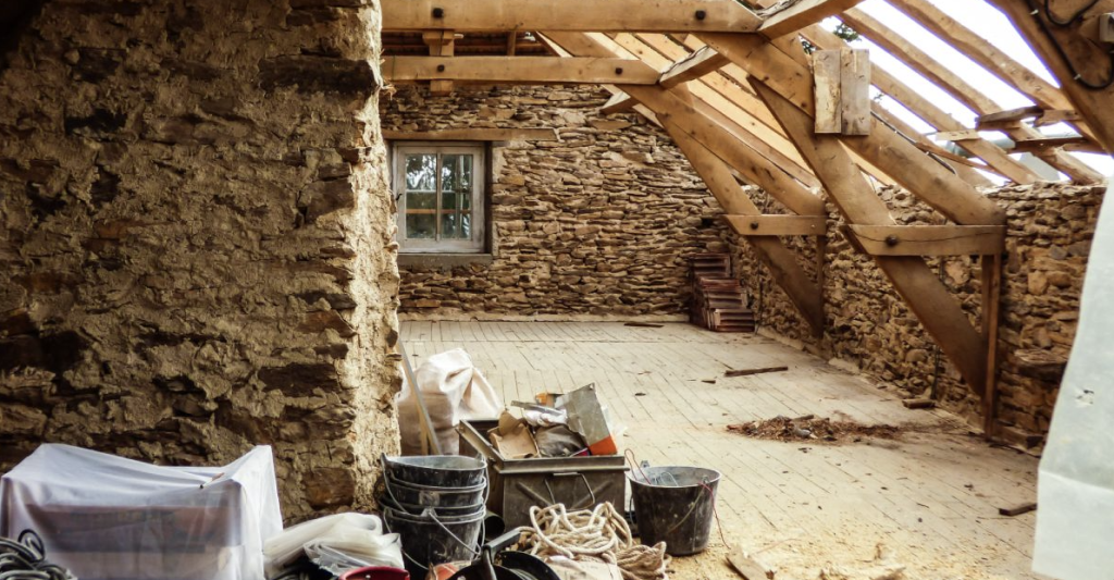 Cobblestone room with renovations taking place.